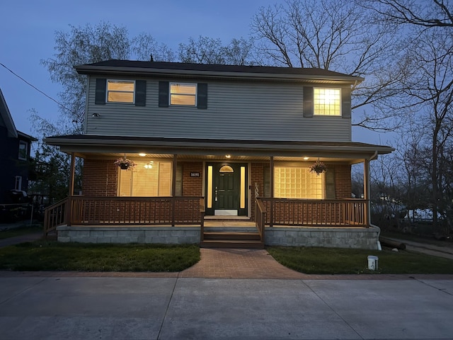 16191 Seymour Rd, Argentine, MI 48451 - view of front facade with a porch and brick siding