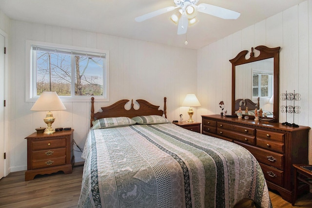 bedroom with wood finished floors and ceiling fan