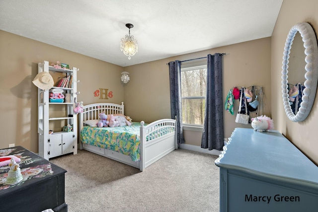 bedroom featuring baseboards and carpet floors