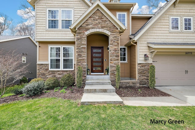 view of front facade featuring stone siding and driveway