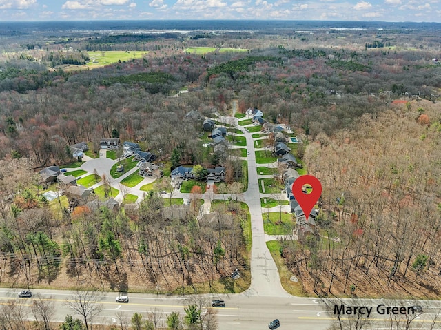 bird's eye view with a residential view and a forest view