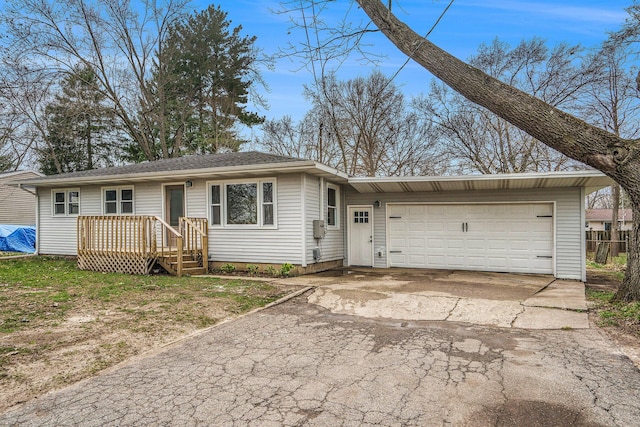 1511 Lake Ave, Portage, MI 49002 - ranch-style house featuring an attached garage and aphalt driveway
