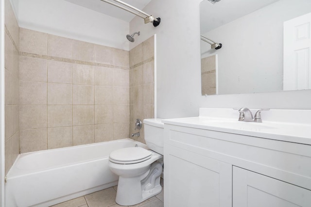 1511 Lake Ave, Portage, MI 49002 - full bath with shower / bathing tub combination, vanity, tile patterned flooring, and toilet