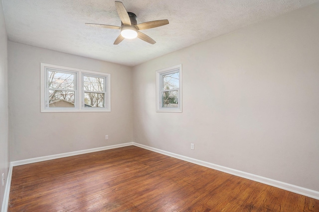1511 Lake Ave, Portage, MI 49002 - empty room featuring wood finished floors, baseboards, a textured ceiling, and ceiling fan