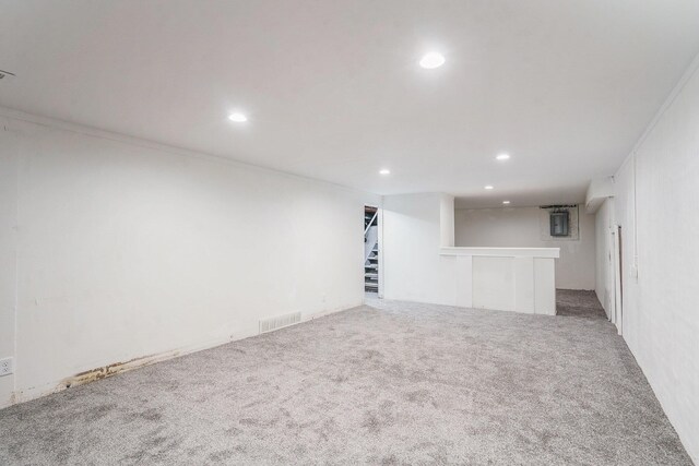 1511 Lake Ave, Portage, MI 49002 - finished basement featuring stairway, carpet flooring, visible vents, and recessed lighting