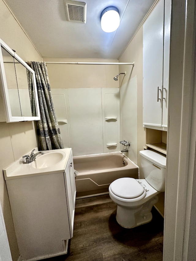 full bath featuring wood finished floors, vanity, shower / bathtub combination with curtain, toilet, and visible vents