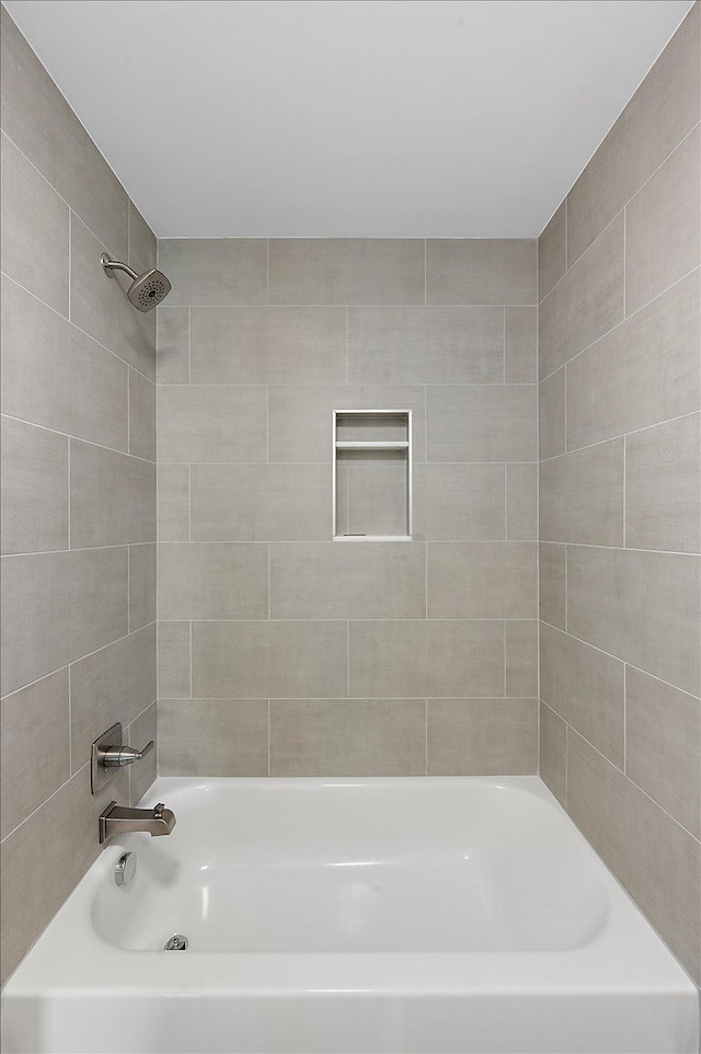 full bath featuring shower / washtub combination
