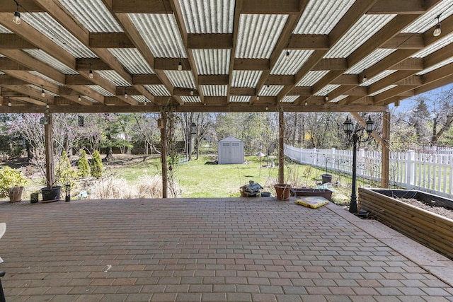 3029 Turnberry Ln, Ann Arbor, MI 48108 - view of patio featuring fence, an outbuilding, and a shed
