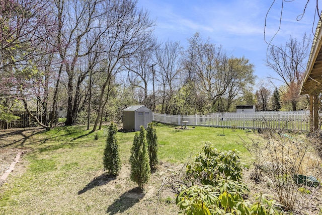 3029 Turnberry Ln, Ann Arbor, MI 48108 - view of yard with fence, an outbuilding, and a storage shed