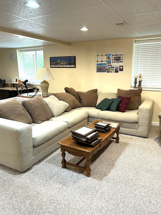 living room with visible vents, carpet flooring, a paneled ceiling, and recessed lighting