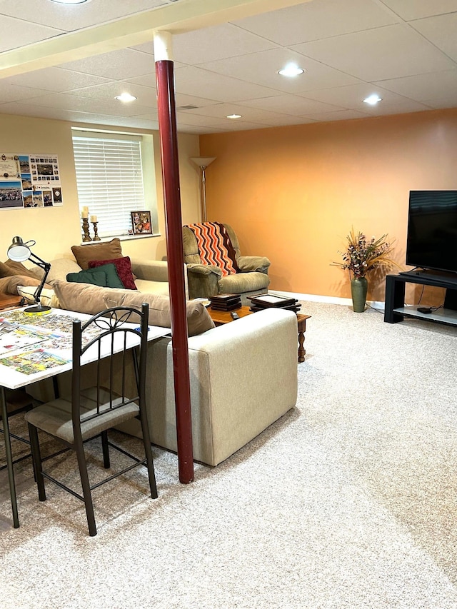 living room with carpet floors, baseboards, and recessed lighting