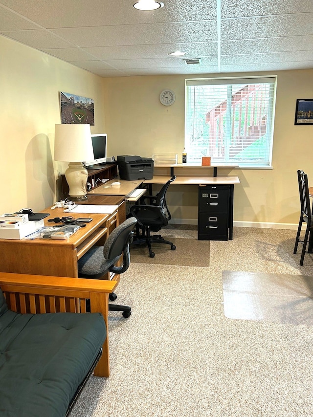 carpeted home office featuring baseboards and visible vents