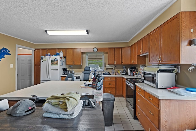 1401 S Williams Lake Rd, Waterford, MI 48327 - kitchen featuring appliances with stainless steel finishes, light countertops, brown cabinets, a textured ceiling, and ornamental molding