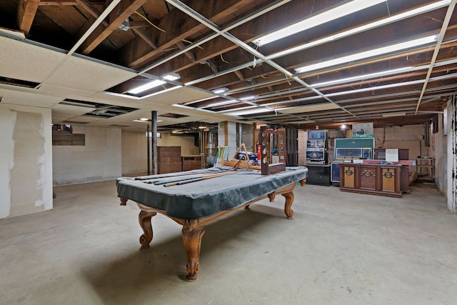 1401 S Williams Lake Rd, Waterford, MI 48327 - playroom featuring unfinished concrete flooring and billiards