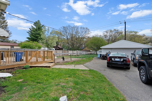 1401 S Williams Lake Rd, Waterford, MI 48327 - view of yard with a garage and a deck
