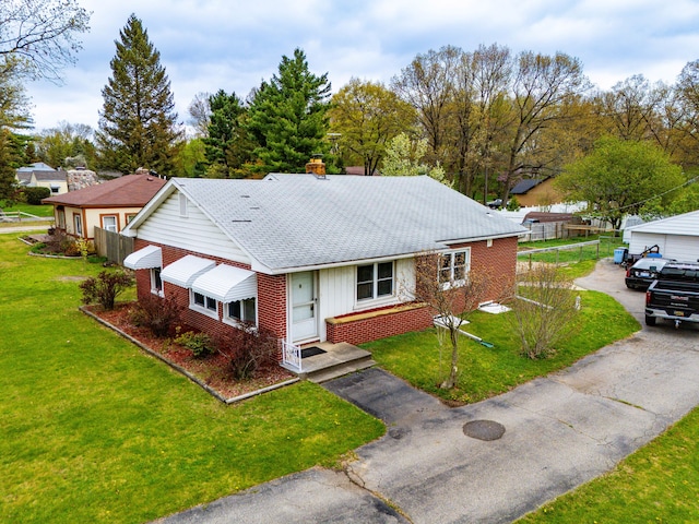 1401 S Williams Lake Rd, Waterford, MI 48327 - view of front facade with brick siding and a shingled roof