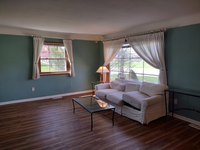 1981 Westfield Rd, Trenton, MI 48183 - living area with wood finished floors, visible vents, and baseboards