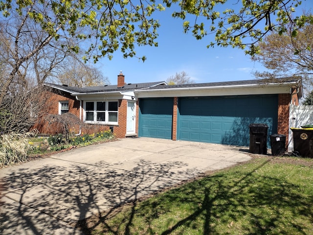 1981 Westfield Rd, Trenton, MI 48183 - ranch-style home featuring a chimney, brick siding, and a garage