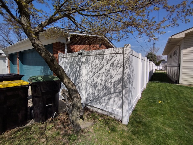 1981 Westfield Rd, Trenton, MI 48183 - view of property exterior with brick siding, fence, and a lawn