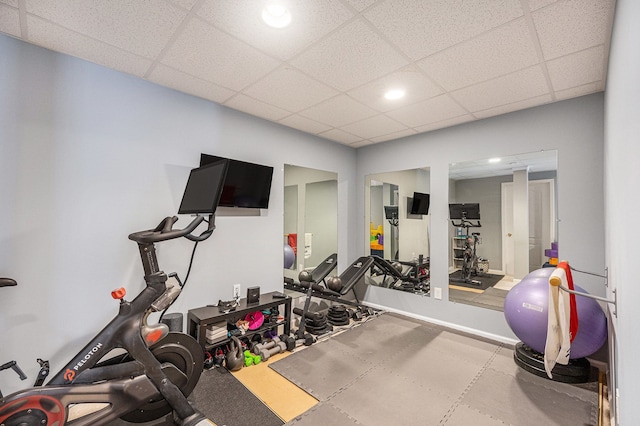 workout area with recessed lighting and a drop ceiling
