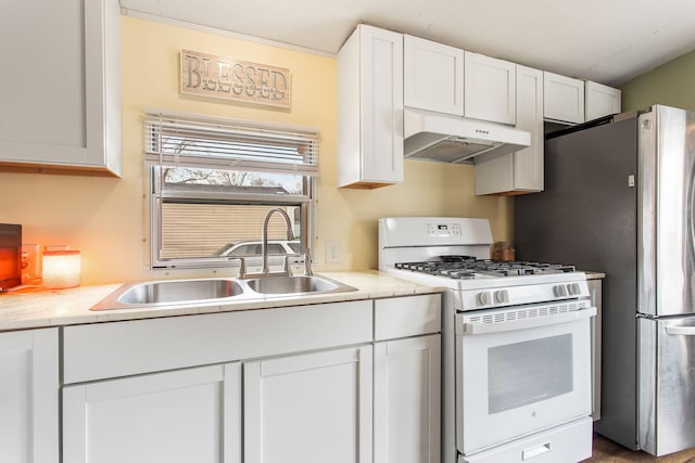 kitchen with a sink, light countertops, white range with gas cooktop, under cabinet range hood, and white cabinetry