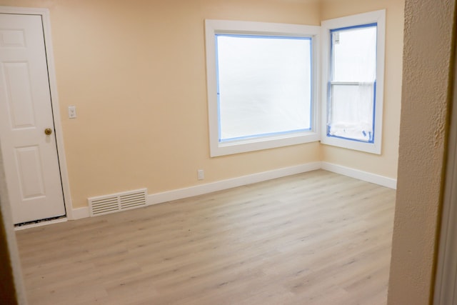 1338 Helen St, Inkster, MI 48141 - spare room with wood finished floors and baseboards