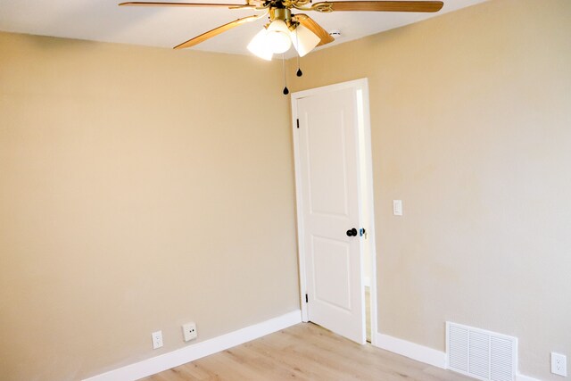 1338 Helen St, Inkster, MI 48141 - empty room with visible vents, light wood finished floors, ceiling fan, and baseboards