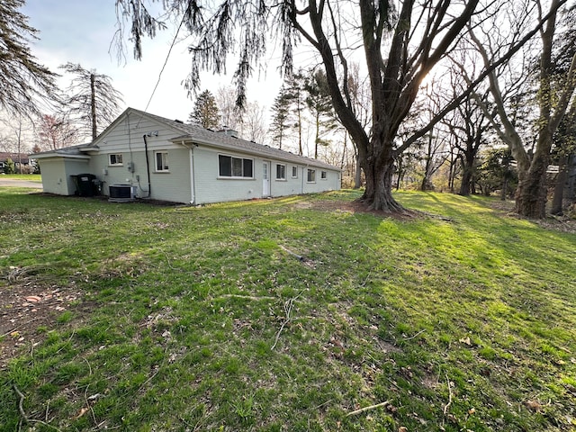 view of yard with central AC