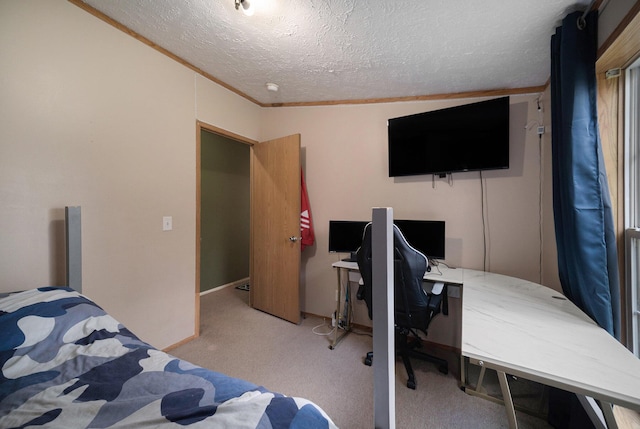 carpeted bedroom featuring a textured ceiling