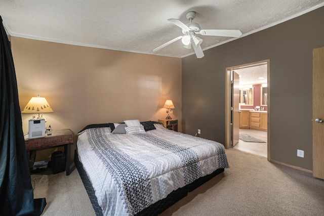 bedroom with carpet, ensuite bath, crown molding, a textured ceiling, and ceiling fan