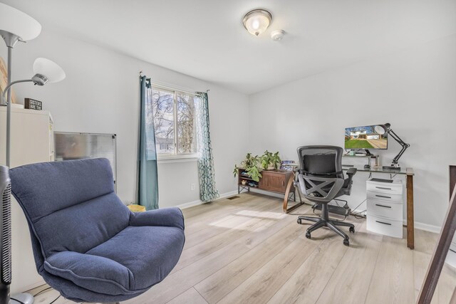 29772 Brentwood St, Southfield, MI 48076 - office area featuring light wood-type flooring, visible vents, and baseboards