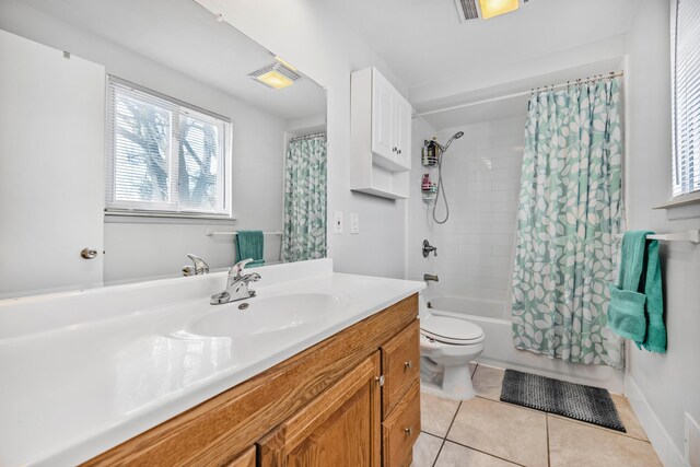 29772 Brentwood St, Southfield, MI 48076 - full bath featuring vanity, shower / bath combination with curtain, baseboards, toilet, and tile patterned flooring