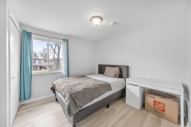 29772 Brentwood St, Southfield, MI 48076 - bedroom with baseboards and light wood-style floors
