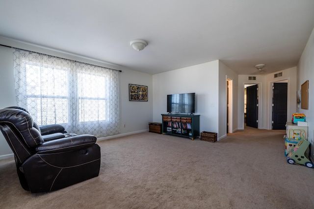 1216 Ellery Grove Ct, Vicksburg, MI 49097 - living area featuring baseboards, visible vents, and carpet