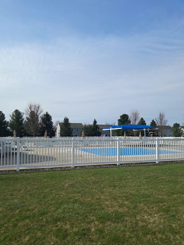 1216 Ellery Grove Ct, Vicksburg, MI 49097 - view of yard featuring fence and a community pool