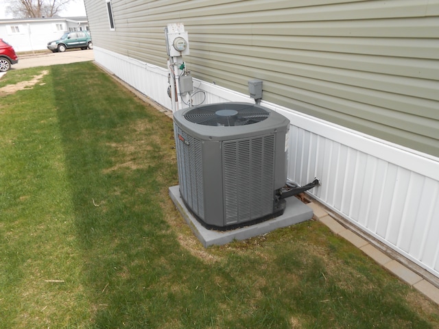 details featuring electric meter and central AC