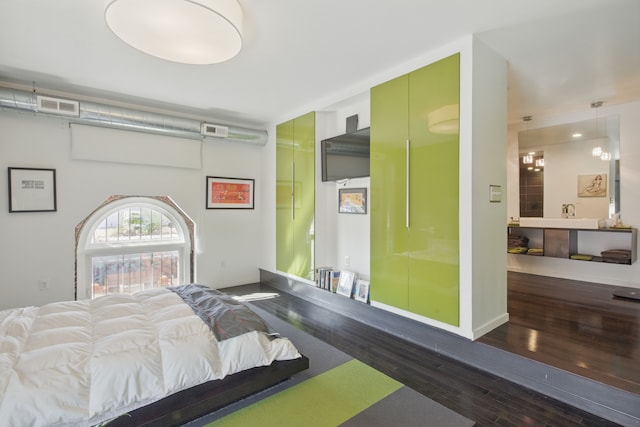 3401 Michigan Ave, Detroit, MI 48216 - bedroom featuring visible vents and wood finished floors