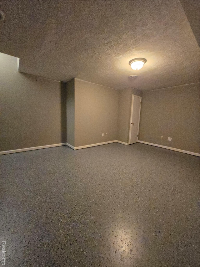 26556 Misty Way, Mattawan, MI 49071 - empty room with a textured ceiling and speckle patterned floor