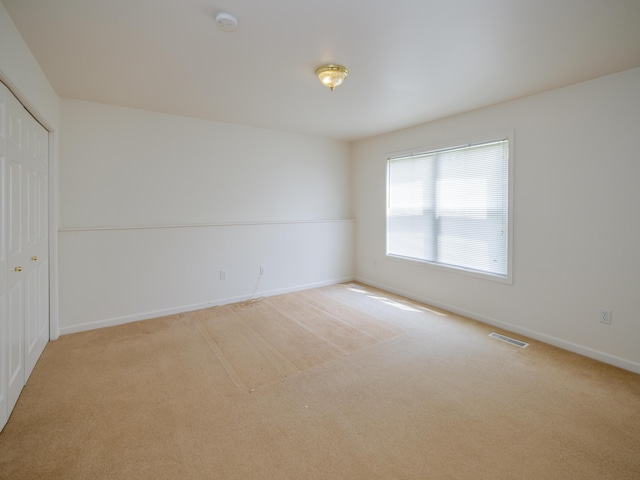 6273 S 12th St, Portage, MI 49024 - carpeted spare room featuring baseboards and visible vents
