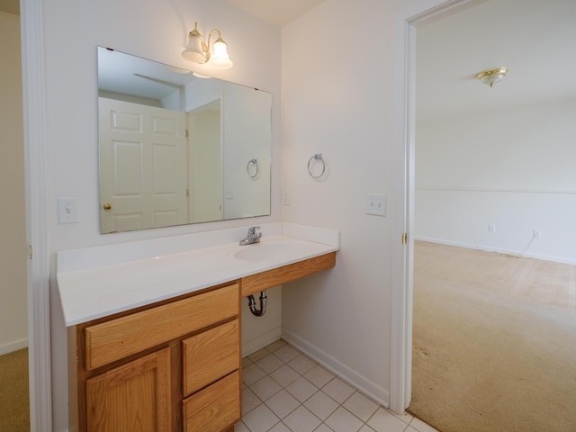 6273 S 12th St, Portage, MI 49024 - bathroom featuring a sink, baseboards, and tile patterned flooring