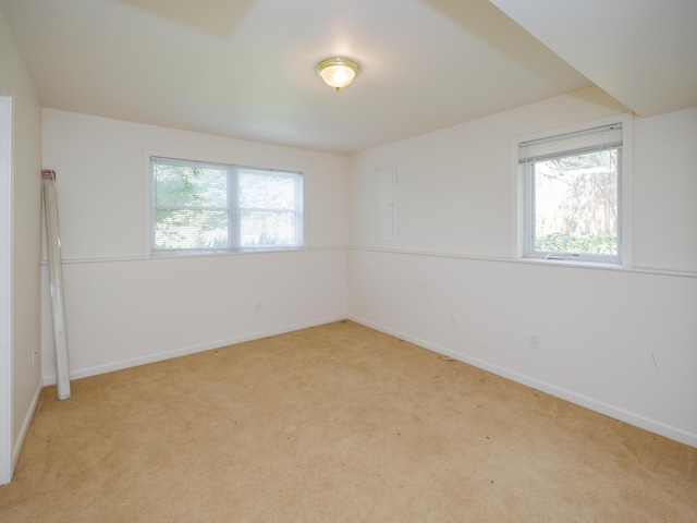 6273 S 12th St, Portage, MI 49024 - spare room with baseboards and light carpet