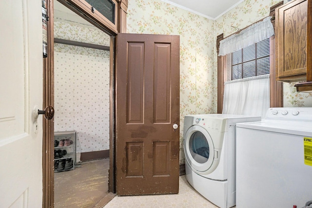 204 E Burr Oak St, Centreville, MI 49032 - laundry area with cabinet space, wallpapered walls, crown molding, and washing machine and clothes dryer