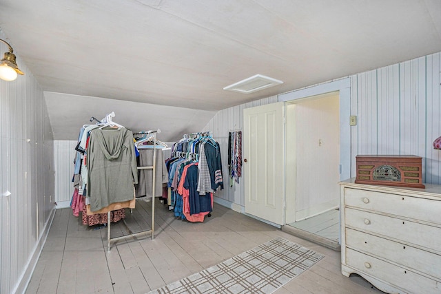 204 E Burr Oak St, Centreville, MI 49032 - walk in closet with attic access, vaulted ceiling, and wood finished floors