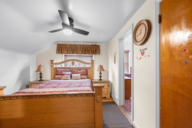 bedroom with lofted ceiling and ceiling fan