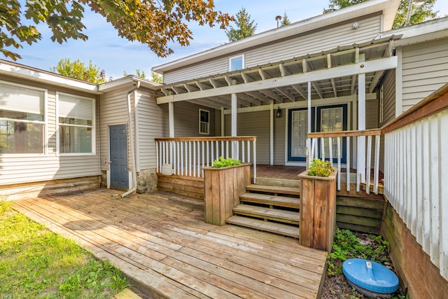 2316 Sugar Riv, Gladwin, MI 48624 - wooden terrace with covered porch