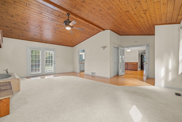 2316 Sugar Riv, Gladwin, MI 48624 - unfurnished living room with ceiling fan, visible vents, light colored carpet, wooden ceiling, and lofted ceiling