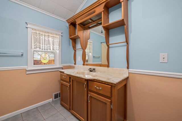 2316 Sugar Riv, Gladwin, MI 48624 - bathroom with tile patterned flooring, crown molding, visible vents, vanity, and baseboards