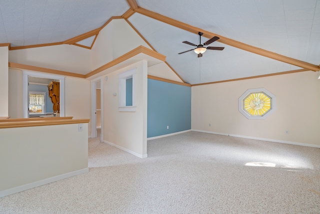 2316 Sugar Riv, Gladwin, MI 48624 - unfurnished living room with ceiling fan, vaulted ceiling, baseboards, and carpet