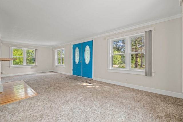 2316 Sugar Riv, Gladwin, MI 48624 - carpeted entrance foyer featuring baseboards and ornamental molding
