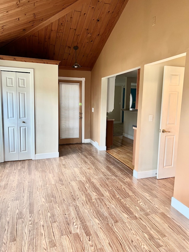 2316 Sugar Riv, Gladwin, MI 48624 - interior space with baseboards, high vaulted ceiling, and light wood-style floors